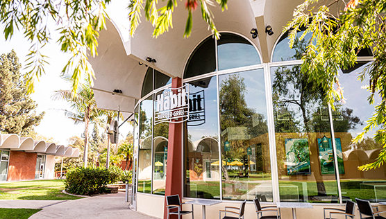 Seating outside at the Habit Burger Grill at the Centrum