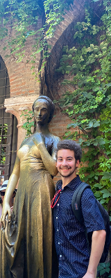 This is a picture of me in Verona standing next to a statue of Juliet from Romeo and Juliet. I captured this moment simply because it was a really special moment to stand next to even a model of one of the most famous characters ever. This moment was very special for me to see something this monumental so it meant a lot for me to respect such a sacred piece of art.