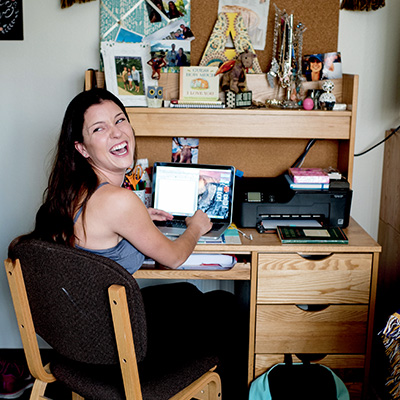 student in dorm room