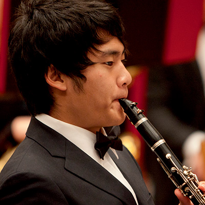 student playing instrument