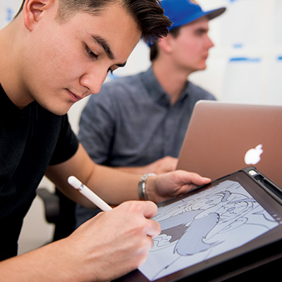 student drawing on iPad Pro